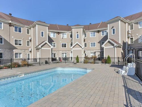 Pool - 5-25 Place Charles-Lemoyne, Sainte-Catherine, QC - Outdoor With In Ground Pool