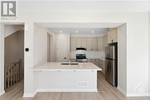 60 Stitch Mews, Ottawa, ON - Indoor Photo Showing Kitchen With Upgraded Kitchen