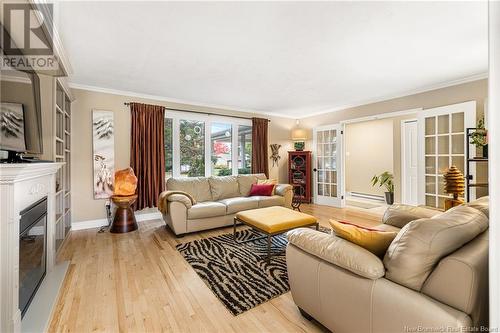 50 Firwood Crescent, Moncton, NB - Indoor Photo Showing Living Room With Fireplace