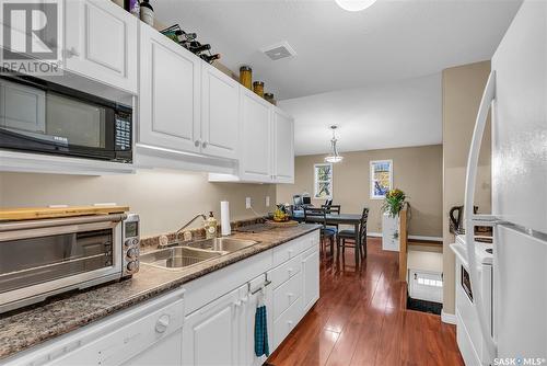 202D 141 105Th Street W, Saskatoon, SK - Indoor Photo Showing Kitchen With Double Sink