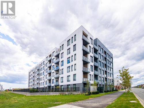 108 - 1440 Clarriage Court, Milton, ON - Outdoor With Facade