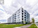 108 - 1440 Clarriage Court, Milton, ON  - Outdoor With Facade 