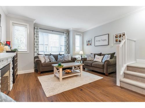 27 7088 191 Street, Surrey, BC - Indoor Photo Showing Living Room With Fireplace