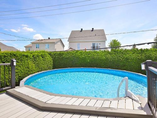 Pool - 1987  - 1989 Rue De Montparnasse, Sainte-Julie, QC - Outdoor With Above Ground Pool With Backyard