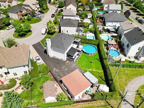 Aerial photo - 1987  - 1989 Rue De Montparnasse, Sainte-Julie, QC - Outdoor With Above Ground Pool With View