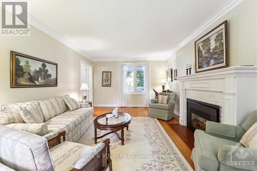 1911 Illinois Avenue, Ottawa, ON - Indoor Photo Showing Living Room With Fireplace