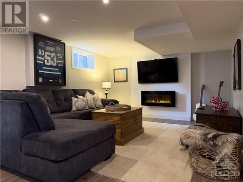 Basement Rec room - 33 Mary Street, Petawawa, ON - Indoor Photo Showing Living Room With Fireplace