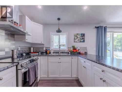 7310 Dawson Road, Prince George, BC - Indoor Photo Showing Kitchen With Double Sink