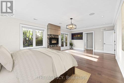 11 Burrows Avenue, Toronto, ON - Indoor Photo Showing Bedroom With Fireplace