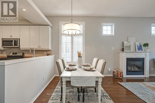 2177 Forest Gate Park, Oakville, ON - Indoor Photo Showing Dining Room With Fireplace