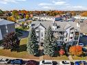 FaÃ§ade - 402-180 Rue Vaudry, Sainte-Thérèse, QC  - Outdoor With View 