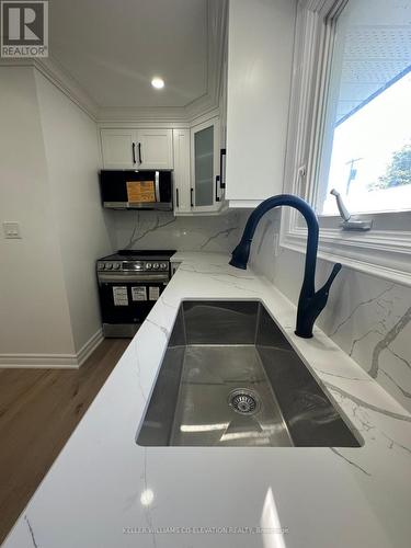 379 Bryant Crescent, Burlington, ON - Indoor Photo Showing Kitchen With Double Sink