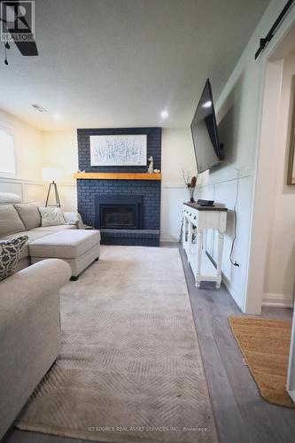 500 Lakeside Road, Fort Erie, ON - Indoor Photo Showing Living Room With Fireplace