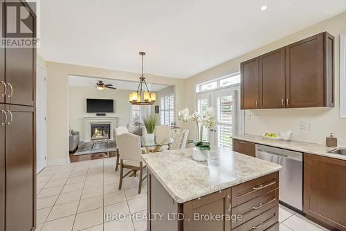 84 Northwest Court, Halton Hills, ON - Indoor Photo Showing Kitchen With Fireplace