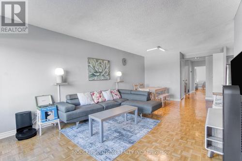 518 - 1000 Cedarglen Gate, Mississauga, ON - Indoor Photo Showing Living Room