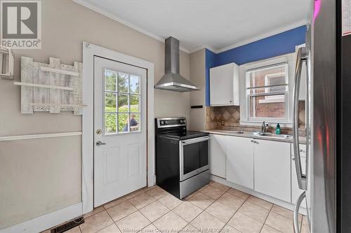 1360 Dougall Avenue, Windsor, ON - Indoor Photo Showing Kitchen With Double Sink