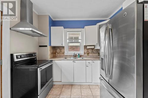 1360 Dougall Avenue, Windsor, ON - Indoor Photo Showing Kitchen With Double Sink