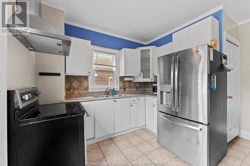 1360 Dougall Avenue, Windsor, ON - Indoor Photo Showing Kitchen With Double Sink