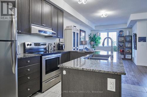 210 - 70 Shipway Avenue, Clarington (Newcastle), ON - Indoor Photo Showing Kitchen With Double Sink With Upgraded Kitchen