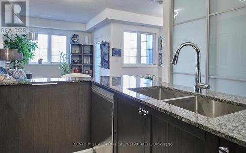 210 - 70 Shipway Avenue, Clarington (Newcastle), ON - Indoor Photo Showing Kitchen With Double Sink