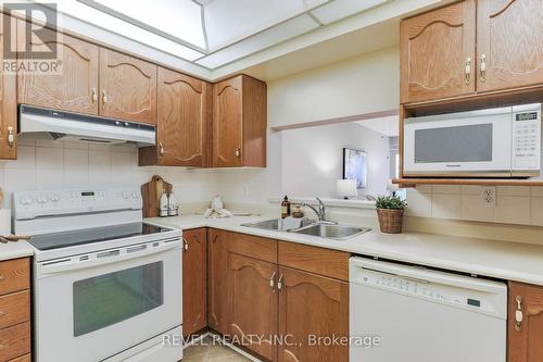 308 - 4 Heritage Way, Kawartha Lakes (Lindsay), ON - Indoor Photo Showing Kitchen With Double Sink