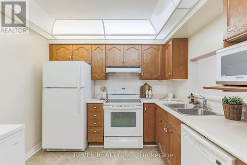 308 - 4 Heritage Way, Kawartha Lakes (Lindsay), ON - Indoor Photo Showing Kitchen With Double Sink