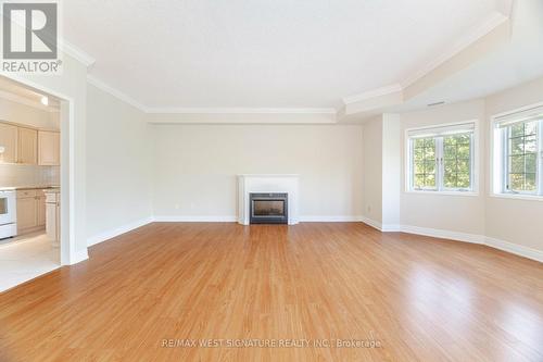 106 - 75 Treelawn Boulevard, Vaughan, ON - Indoor Photo Showing Other Room With Fireplace