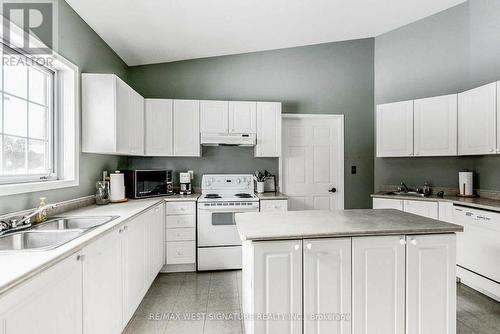 106 - 75 Treelawn Boulevard, Vaughan, ON - Indoor Photo Showing Kitchen With Double Sink