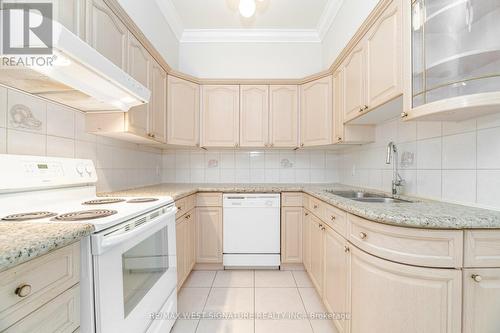 106 - 75 Treelawn Boulevard, Vaughan, ON - Indoor Photo Showing Kitchen With Double Sink