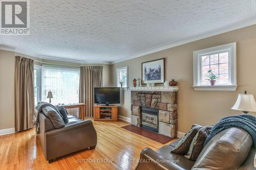 97 Huron Street, London, ON - Indoor Photo Showing Living Room With Fireplace