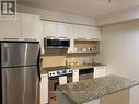 202 - 21 Carlton Street, Toronto, ON  - Indoor Photo Showing Kitchen With Stainless Steel Kitchen With Double Sink With Upgraded Kitchen 