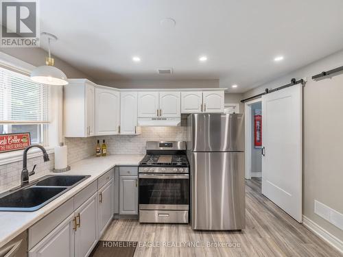 61 Dancy Drive, Orillia, ON - Indoor Photo Showing Kitchen With Double Sink