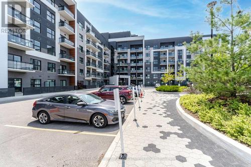 131 - 128 Grovewood Common, Oakville, ON - Outdoor With Facade