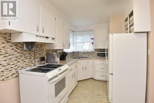 141 Reid Avenue S, Hamilton, ON - Indoor Photo Showing Kitchen With Double Sink