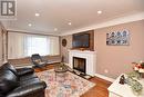 141 Reid Avenue S, Hamilton, ON  - Indoor Photo Showing Living Room With Fireplace 