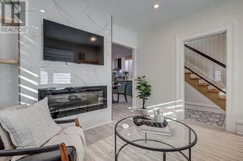 84 Ross Street, St. Thomas, ON - Indoor Photo Showing Living Room With Fireplace