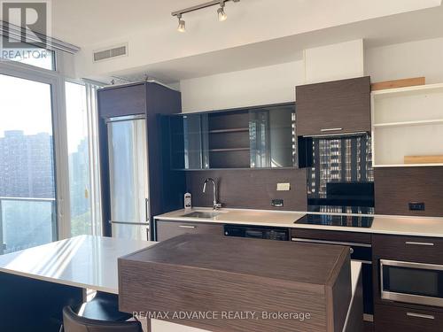 1408 - 75 St Nicholas Street, Toronto, ON - Indoor Photo Showing Kitchen With Upgraded Kitchen