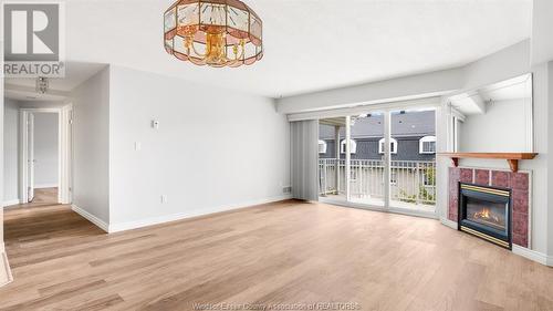 1995 Normandy Street Unit# 306, Lasalle, ON - Indoor Photo Showing Other Room With Fireplace