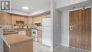 1995 Normandy Street Unit# 306, Lasalle, ON  - Indoor Photo Showing Kitchen With Double Sink 