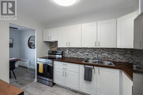 1008 - 10 Parkway Forest Drive, Toronto (Henry Farm), ON - Indoor Photo Showing Kitchen With Double Sink With Upgraded Kitchen