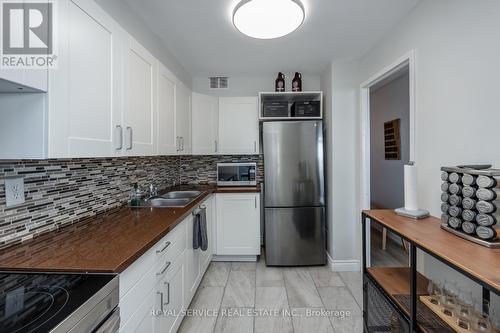 1008 - 10 Parkway Forest Drive, Toronto (Henry Farm), ON - Indoor Photo Showing Kitchen With Double Sink