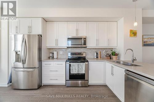 94 - 1890 Rymal Road E, Hamilton, ON - Indoor Photo Showing Kitchen With Stainless Steel Kitchen With Double Sink