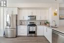 94 - 1890 Rymal Road E, Hamilton, ON  - Indoor Photo Showing Kitchen With Stainless Steel Kitchen With Double Sink 