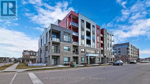 402 - 3285 Carding Mill Trail, Oakville, ON - Outdoor With Balcony With Facade