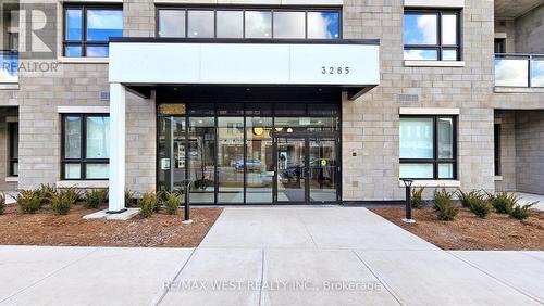 402 - 3285 Carding Mill Trail, Oakville, ON - Outdoor With Facade