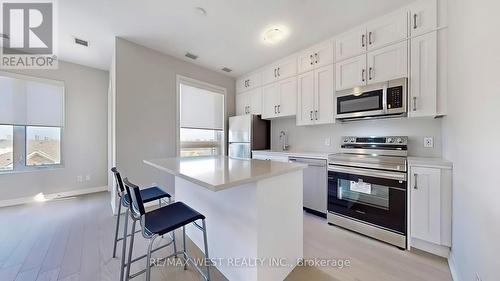 402 - 3285 Carding Mill Trail, Oakville, ON - Indoor Photo Showing Kitchen