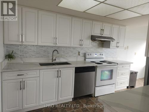 1611 - 330 Alton Towers Circle E, Toronto, ON - Indoor Photo Showing Kitchen With Double Sink