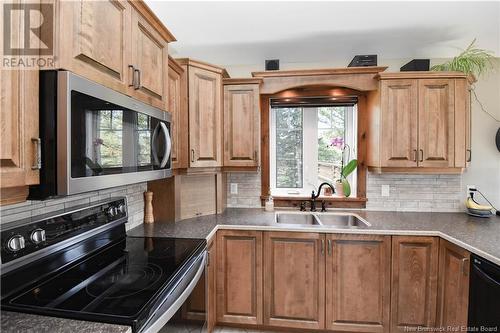 102 Mazerolle Street, Shippagan, NB - Indoor Photo Showing Kitchen With Double Sink