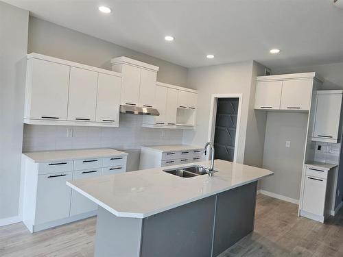 31 Barnes Avenue, West St Paul, MB - Indoor Photo Showing Kitchen With Double Sink