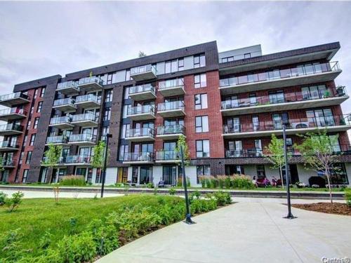 EntrÃ©e extÃ©rieure - 607-6 Av. Donegani, Pointe-Claire, QC - Outdoor With Balcony With Facade